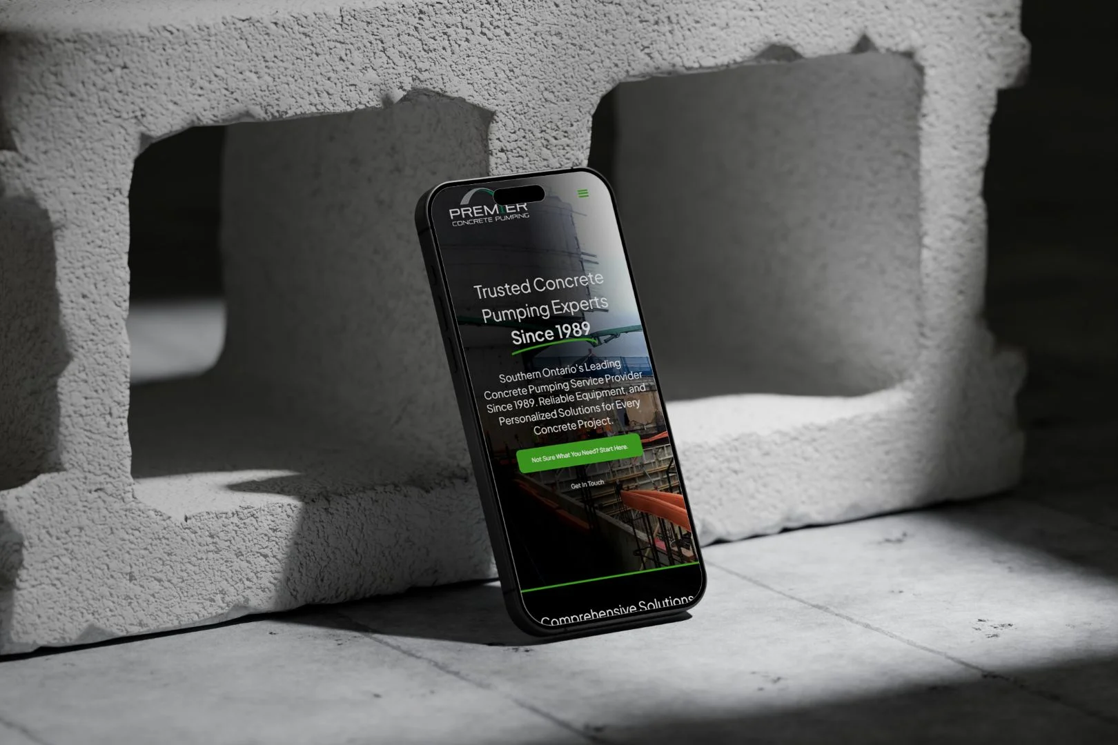Premier Concrete Pumping Website design on a mockup by Groundwork Agency