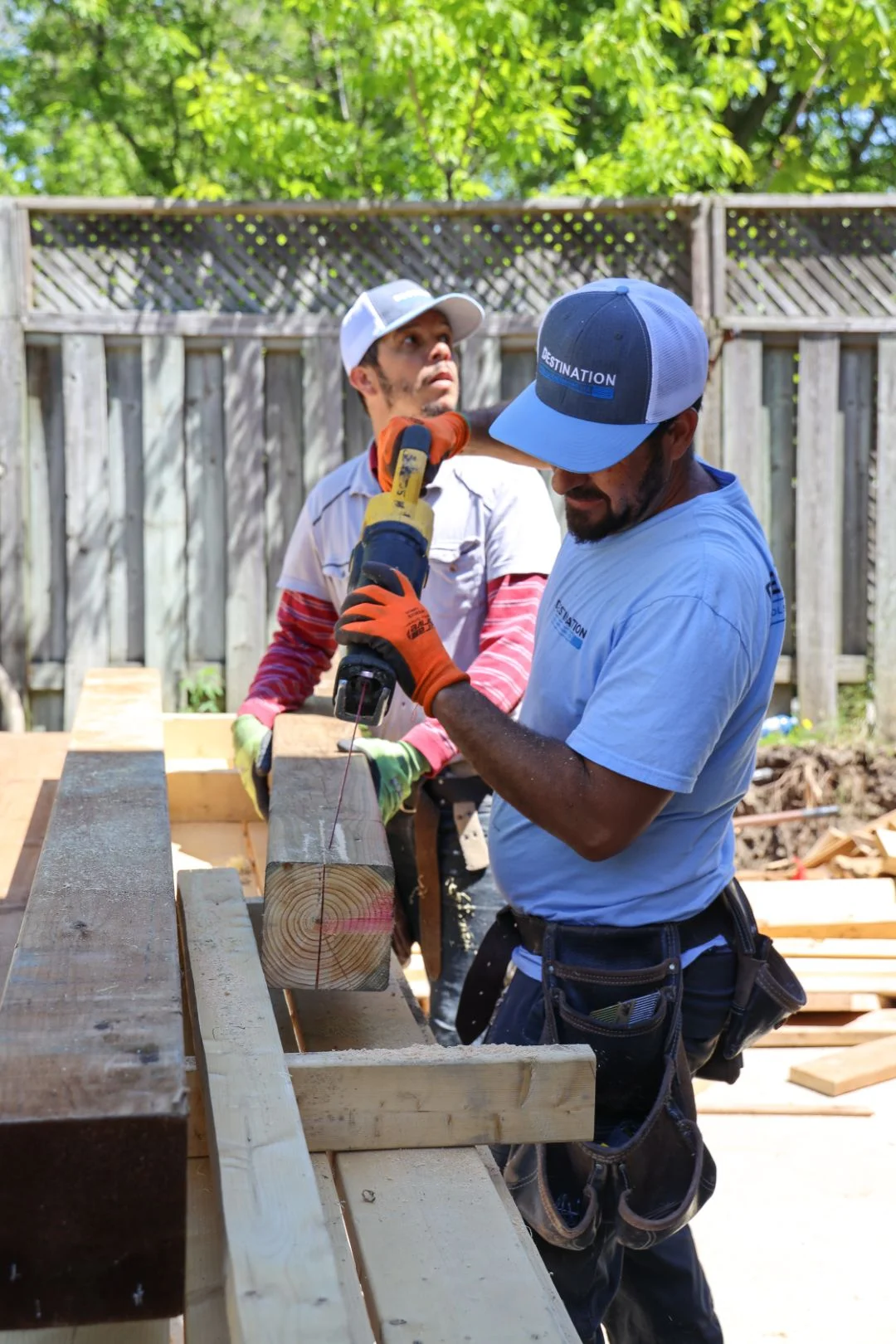 Destination Pools crew working on backyard landscape and pool construction project